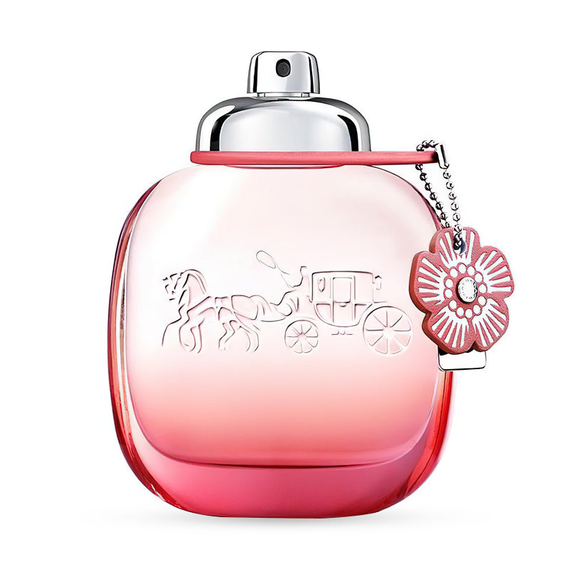 Elegant pink perfume bottle with an embossed horse and carriage design and a flower-shaped charm.