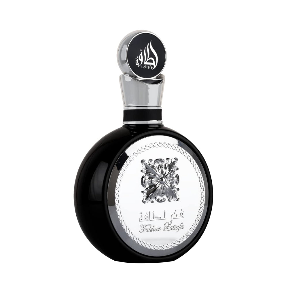 Elegant black perfume bottle with ornate silver detailing and Arabic script, featuring Lattafa branding, isolated on a white background.