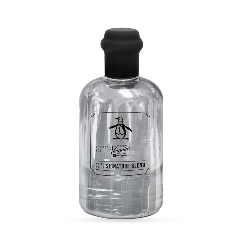 Transparent glass bottle with a black cap labeled "Penguin Signature Blend".