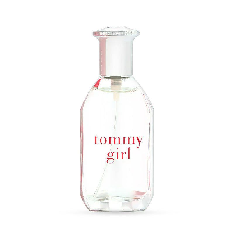 Clear glass bottle of Tommy Girl perfume with white cap and red text.