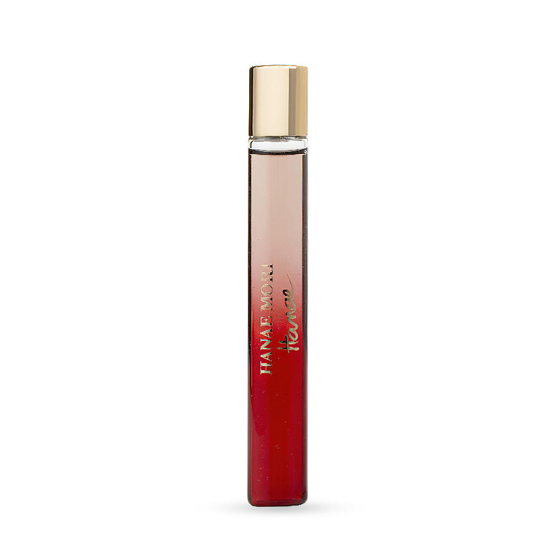 Elegant perfume bottle with gold cap and red ombre glass design.
