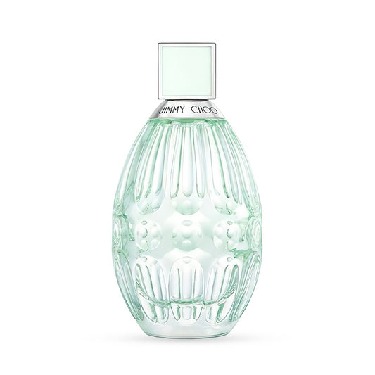 Elegant Jimmy Choo perfume bottle with a textured glass design and pale green hue.