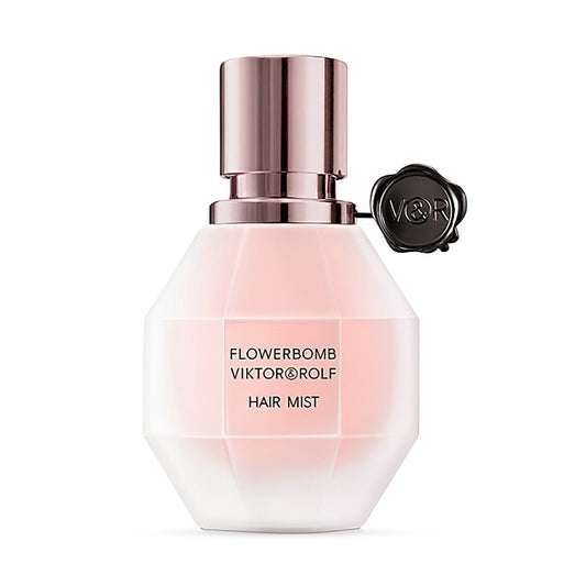 Viktor & Rolf Flowerbomb hair mist bottle with pink and white design and black logo charm.