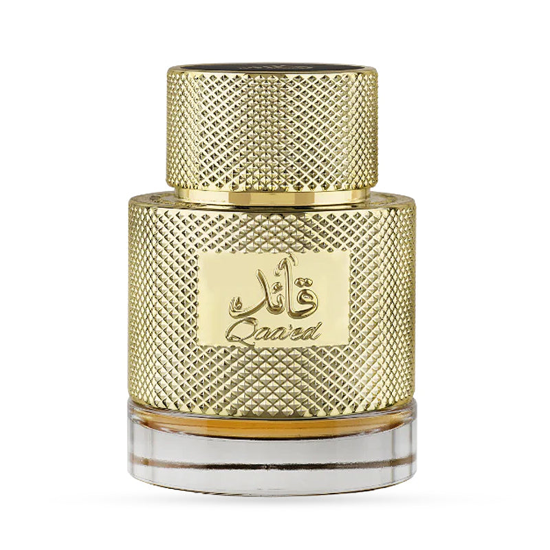 Luxurious gold perfume bottle with textured design and Arabic script, clear base, high-end fragrance packaging.