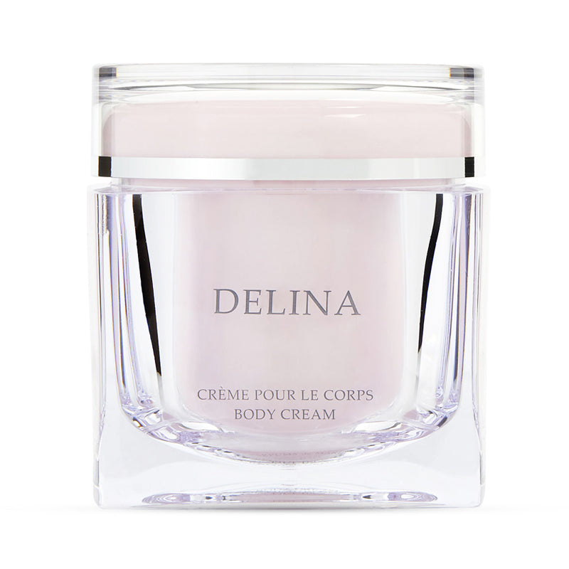 Luxury Delina scented candle in elegant glass container.