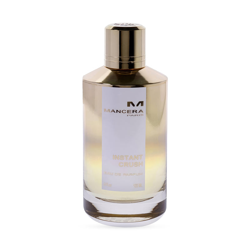 Luxury perfume bottle with gold cap and clear label design.