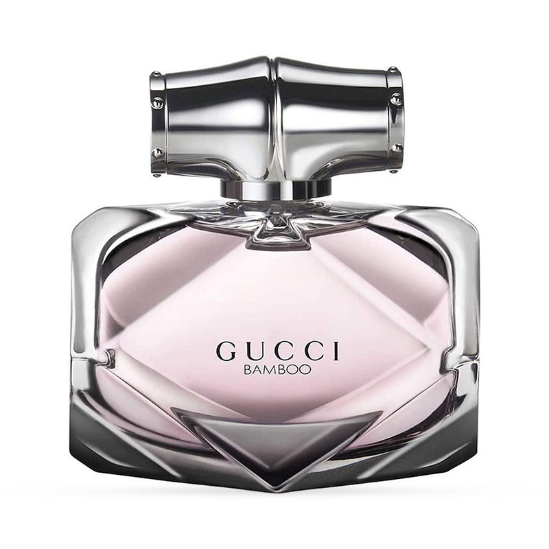 Gucci Bamboo perfume bottle with silver cap and light pink fragrance.