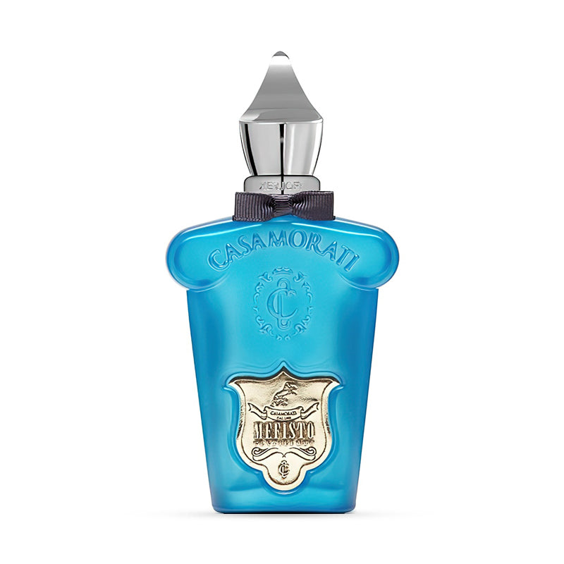 Blue Casamorati perfume bottle with silver cap and intricate emblem design.