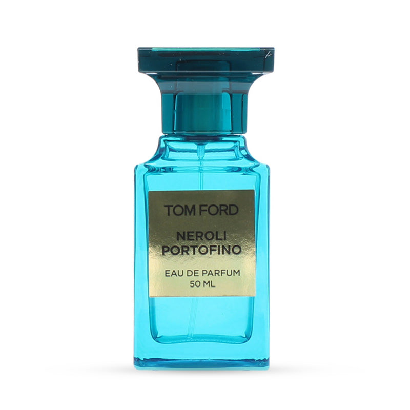 Teal glass fragrance bottle with gold label displaying product name.