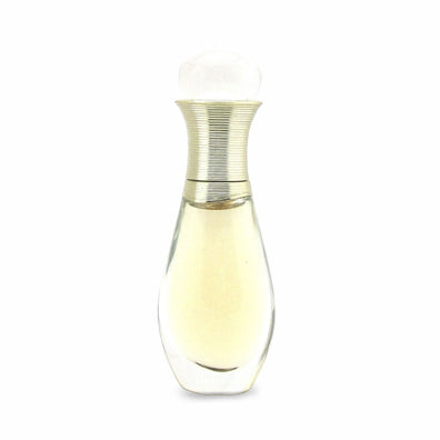 elegant perfume bottle with golden accents containing light yellow fragrance