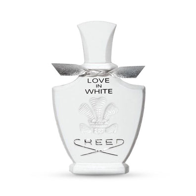 Chopard Casmir perfume bottle with white floral design and elegant cap.