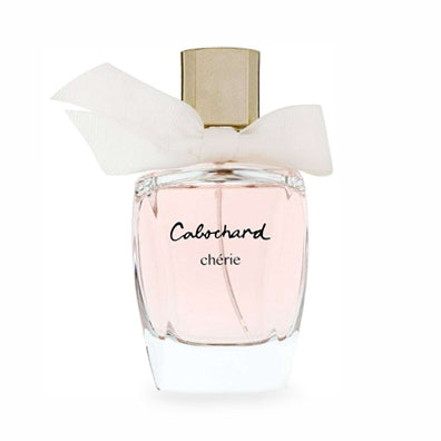 Cabochard Chérie perfume bottle with pink liquid and a gold cap adorned with a white bow.