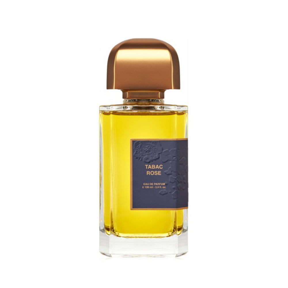 Luxury perfume bottle of Tabac Rose Eau de Parfum with gold cap and amber liquid, 100ml.