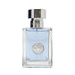 Clear glass perfume bottle with silver cap and light blue fragrance inside.